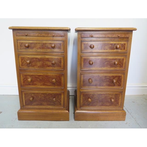 88 - A pair of burr wood veneer four drawer bedside chests each with a slide, reveneered by made by a loc... 