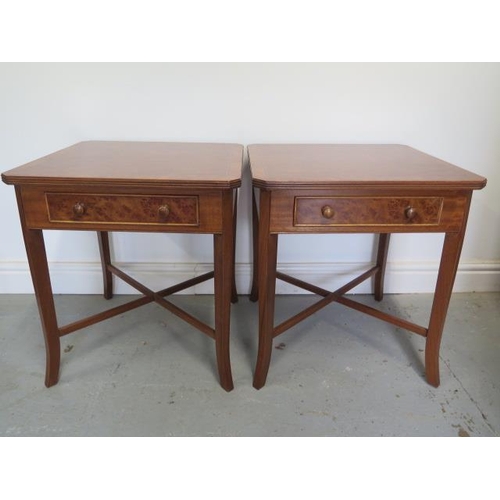 89 - A pair of burr wood veneer lamp tables each with a drawer on splayed legs united by cross stretchers... 