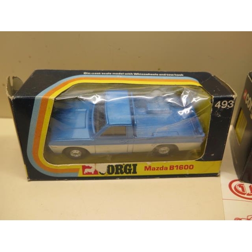 907 - Two Burago 1:18 scale cars and a Revell and a Polistil car, all boxed, some wear to boxes plastic bu... 