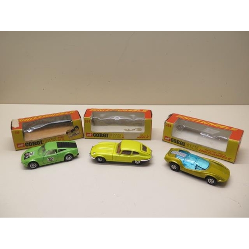 907 - Two Burago 1:18 scale cars and a Revell and a Polistil car, all boxed, some wear to boxes plastic bu... 