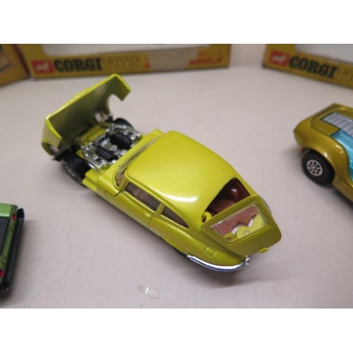 907 - Two Burago 1:18 scale cars and a Revell and a Polistil car, all boxed, some wear to boxes plastic bu... 