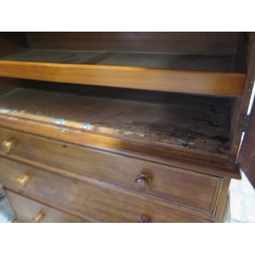 91 - A Victorian walnut linen press with a two door top enclosing three linen slides above three long dra... 