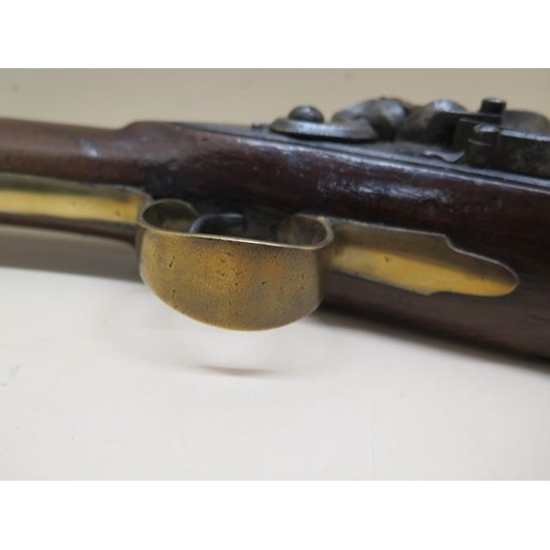 940 - A flintlock canon barrelled blunderbuss, the lock signed Cox, barrel length 38cm, total length 79cm,... 