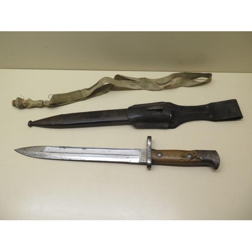 942 - A German knife bayonet with scabbard and Troddel, the blade marked Weyersberg Kirschbaum & Co Solige... 