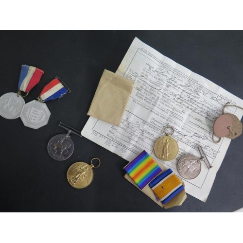 944 - Two WW1 pairs of medals 108921 2CPL C STRATTON RE with dog tags and with discharge certificate of a ... 