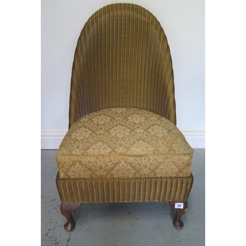 A Lloyd loom chair with drop in upholstered seat, 82cm tall, seat height 37cm