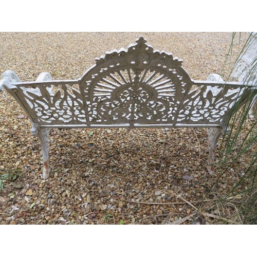15 - A good cast iron garden bench, 95cm tall x 119cm x 60cm, in painted condition