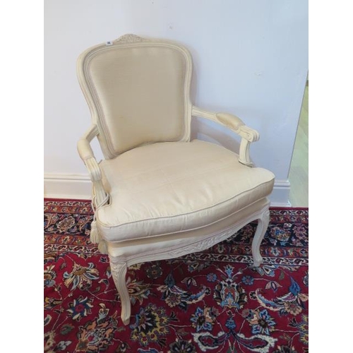 32 - A French style painted open armchair upholstered in Dupion silk, 94cm tall x 68cm wide, generally go... 