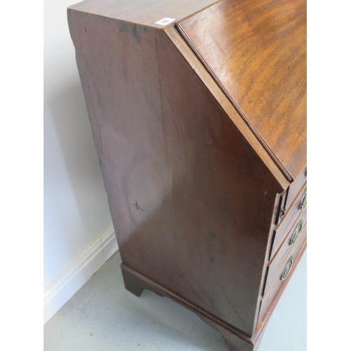 60 - A Georgian mahogany four drawer bureau of small proportions with a fitted interior, 95cm tall x 86cm... 