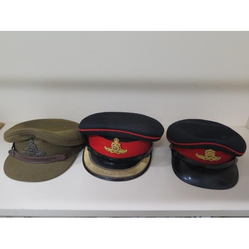 943 - Three Royal Artillery officers peaked caps