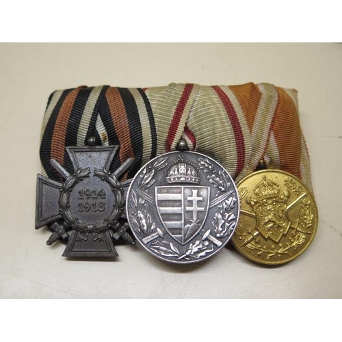 947 - A German trio of medals including an Austro-Hungarian medal