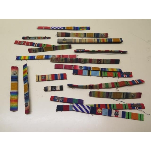 951 - Twenty medal ribbons WWI-WWII, all with emblems including one Battle of Britain rosette - mentioned ... 