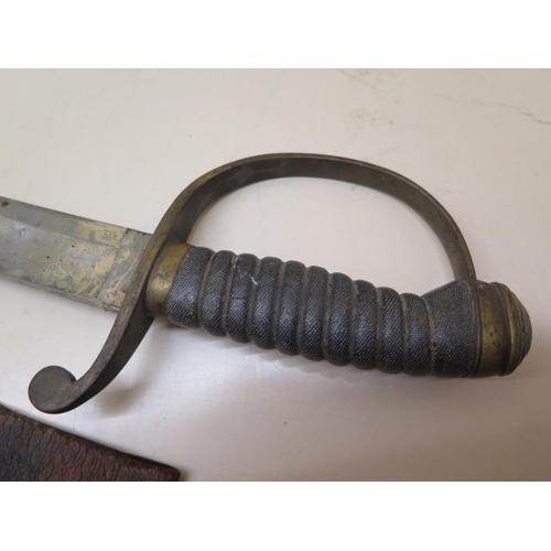 954 - A brass hilted Police or Customs hanger sword with shagreen grip and leather scabbard, blade length ... 