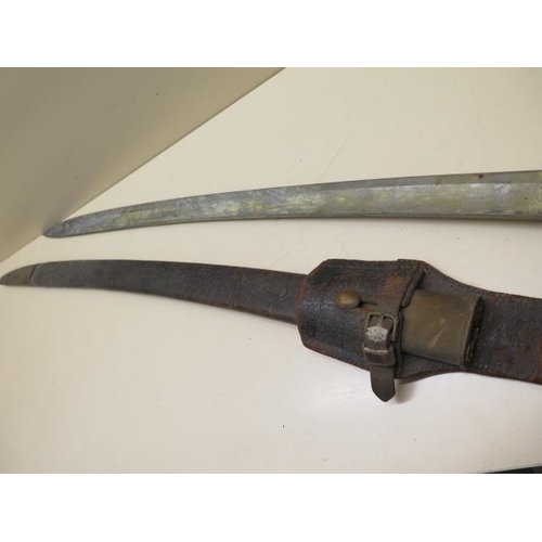 954 - A brass hilted Police or Customs hanger sword with shagreen grip and leather scabbard, blade length ... 