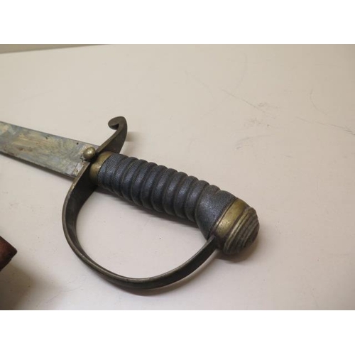 954 - A brass hilted Police or Customs hanger sword with shagreen grip and leather scabbard, blade length ... 