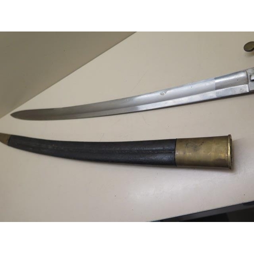 956 - A brass hilted Police or Customs hanger sword with shagreen grip and leather scabbard, blade length ... 