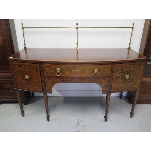 100 - A 19th century inlaid mahogany bowfronted sideboard with two drawers and a cupboard having a brass r... 