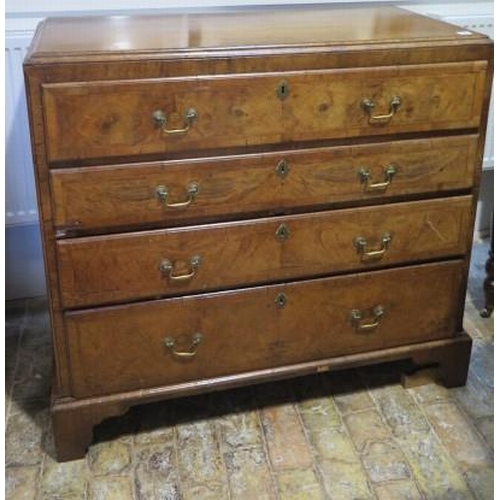 102 - A Georgian and later walnut four drawer chest on bracket feet, 101cm tall x 110cm x 53cm