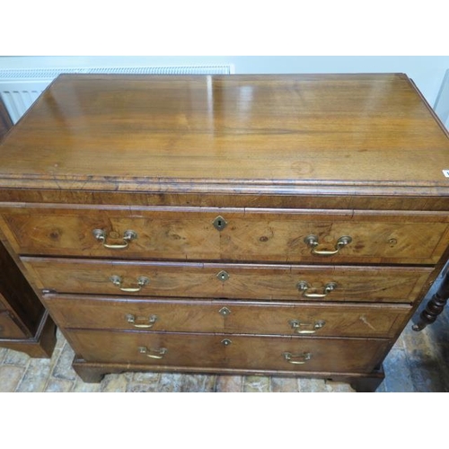 102 - A Georgian and later walnut four drawer chest on bracket feet, 101cm tall x 110cm x 53cm