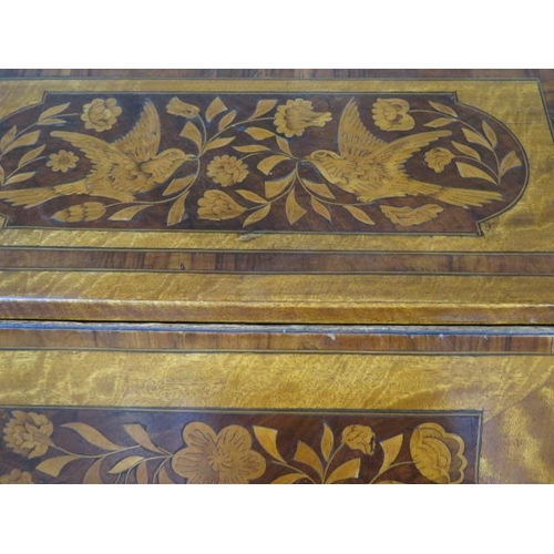 103 - A marquetry inlaid four drawer bureau with a fitted interior, 111cm tall x 97cm x 48cm