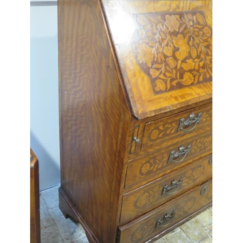 103 - A marquetry inlaid four drawer bureau with a fitted interior, 111cm tall x 97cm x 48cm