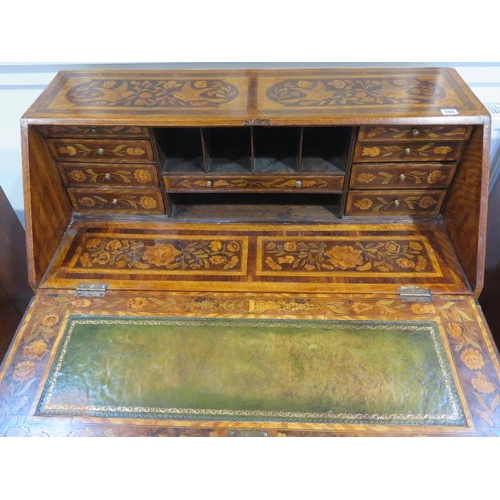 103 - A marquetry inlaid four drawer bureau with a fitted interior, 111cm tall x 97cm x 48cm