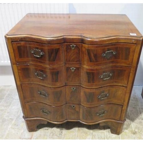 104 - A Georgian style walnut serpentine fronted four drawer chest, 82cm tall x 75cm x 47cm