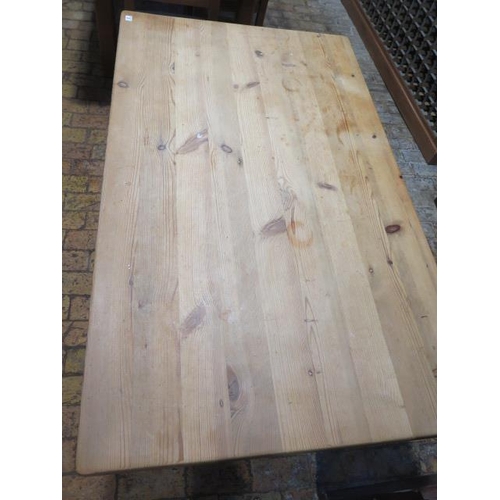 2 - A Victorian style modern  pine kitchen table with a painted base, 78cm tall x 152cm x 90cm