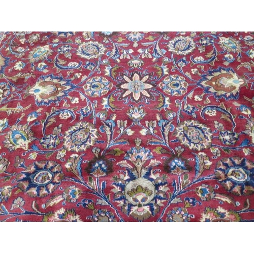 223 - A hand knotted woollen Meshed rug, 3.74m x 2.90m