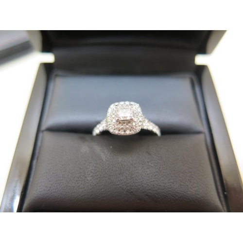 612 - A hallmarked 18ct white gold diamond ring with one princess cut 0.30ct diamond, clarity VS2 colour F... 