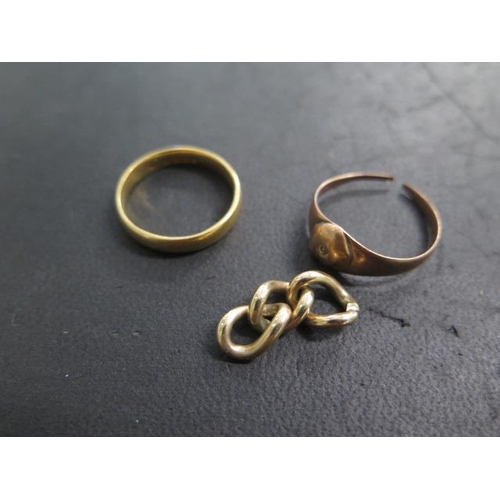 613 - A 22ct yellow gold band ring, size Q, approx 5.2 grams, a part gilt metal chain and cut ring, both t... 