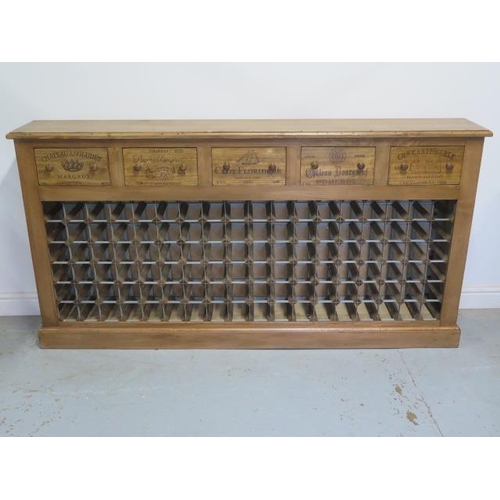 8 - A pine 108 bottle wine rack with four wine box fronted drawers, made by a local craftsman to a high ... 