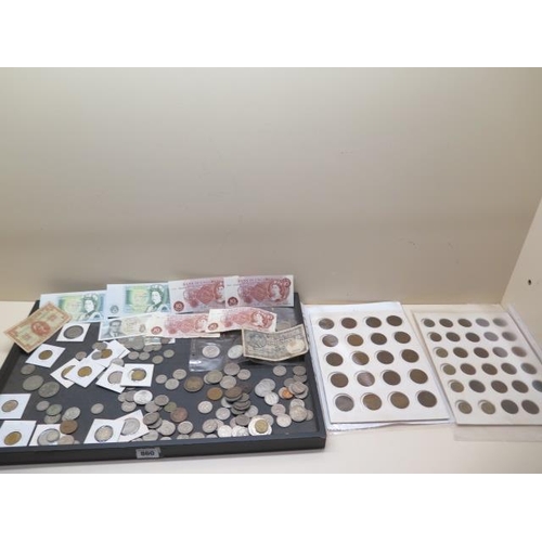 860 - A collection of mixed coins and bank notes