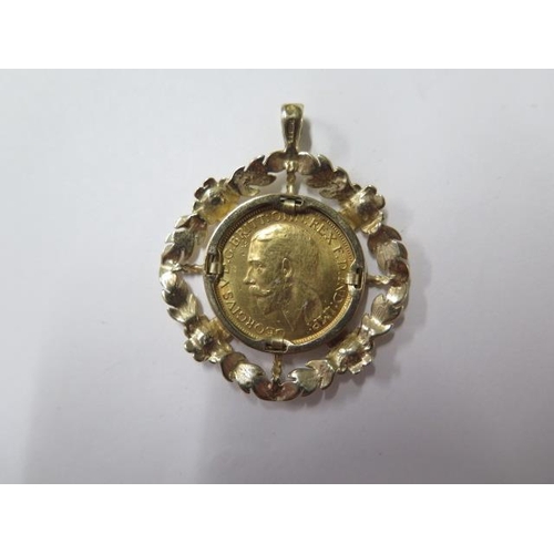 861 - A George V gold full sovereign, dated 1927 in a 9ct pendant mount, total weight approx 15 grams