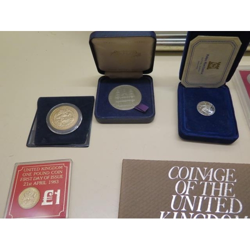 869 - A framed 1954 coin and banknote set and other coinage including four coin collections