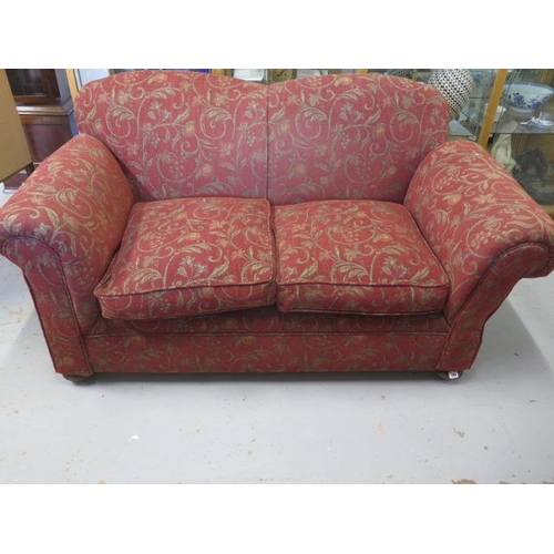 94 - A reupholstered early 1900s drop end two seater sofa, 84cm tall x 163cm x 82cm