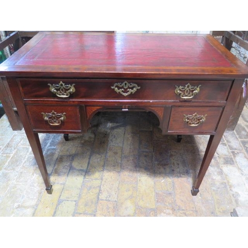 97 - An Edwardian mahogany inlaid ebony and satinwood strung kneehole desk with red tooled leather top, t... 