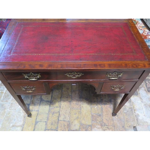 97 - An Edwardian mahogany inlaid ebony and satinwood strung kneehole desk with red tooled leather top, t... 