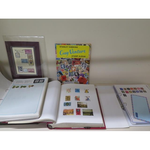 985 - Four stamp albums with World stamps