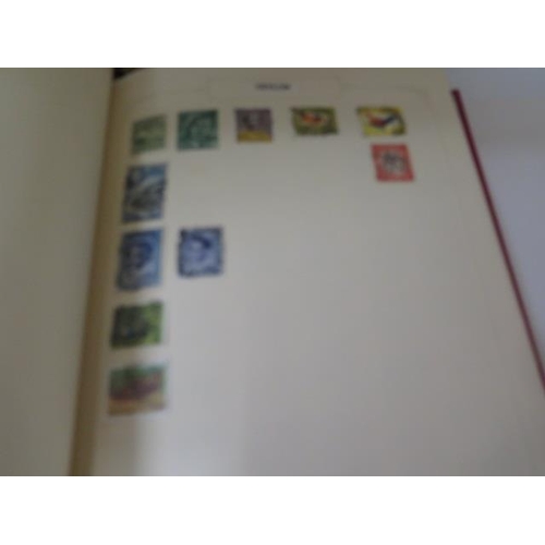 985 - Four stamp albums with World stamps