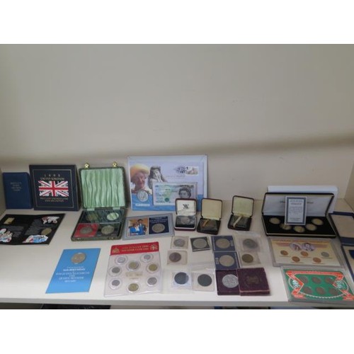 873 - A collection of assorted coins to include a boxed set of 24ct gold state quarters and a masonic silv... 