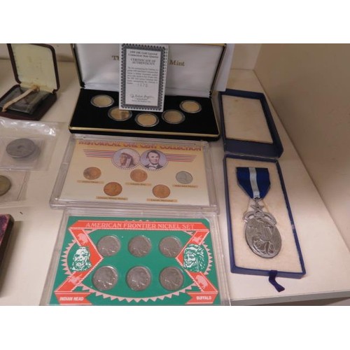 873 - A collection of assorted coins to include a boxed set of 24ct gold state quarters and a masonic silv... 