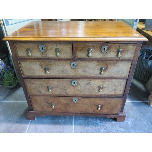 106 - A Georgian and later five drawer walnut chest on bracket feet, 88cm tall x 99cm x 58cm