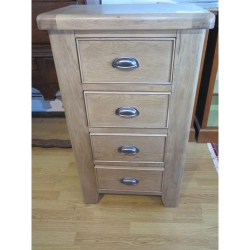 16 - An ex display Canterbury Oak 4 drawer chest retail £260,  100 cm tall x 59cm x 40 cm