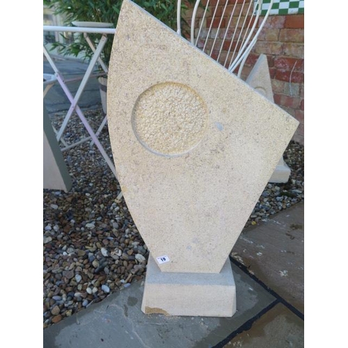 19 - A hand carved abstract garden sculpture made from Clipsham limestone, 75cm tall x 40cm wide