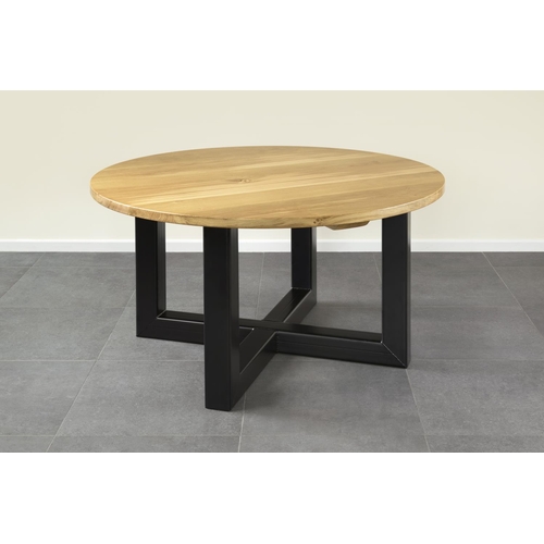 23 - A new good quality solid oak and steel dining table, 76cm tall x 140cm diameter RRP £950
