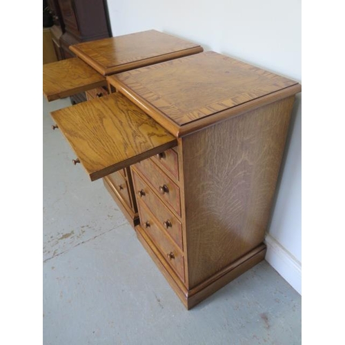 31 - A pair of new burr oak bedside chests, each with a slide above four drawers, made by a local craftsm... 