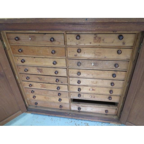 53 - A pine and mahogany collectors / specimen chest with 17 internal drawers (missing one), enclosed by ... 
