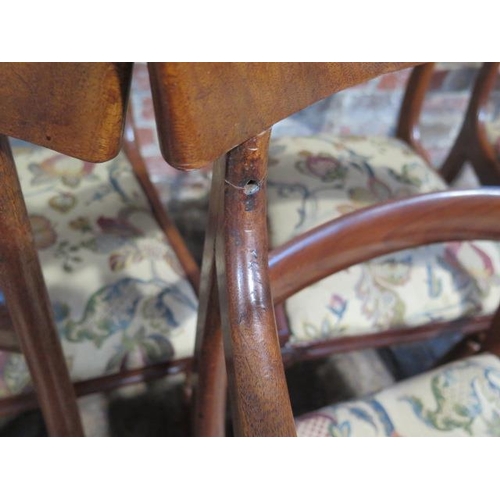 61 - A set of seven 19th century mahogany dining chairs with drop in seats including a scroll arm carver,... 