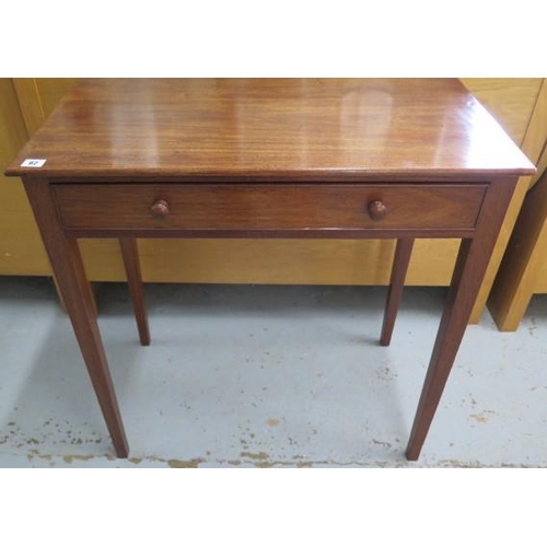 62 - A 19th century mahogany sidetable with a drawer on square tapering legs, in good condition, 77cm tal... 